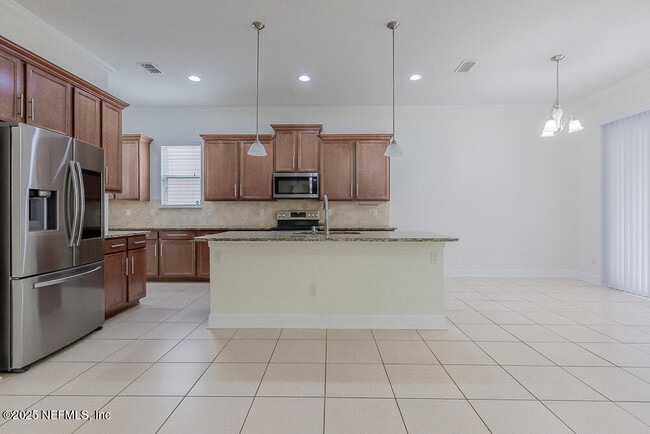 Building Photo - 4599 Plantation Oaks Blvd