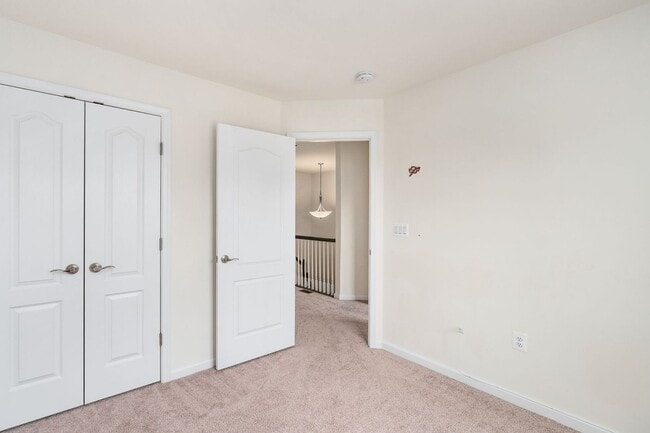 Building Photo - Your Next Home: Modern 3-Level Townhome with Garage, Deck & Huge Flex Space