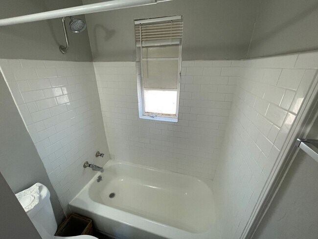 Building Photo - Remodeled Two Bedroom, End Unit with A/C and Large Fenced Yard at La Terraza!!