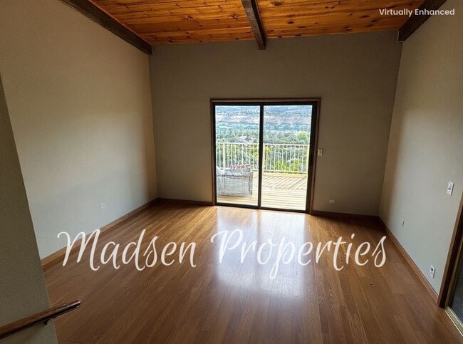 Building Photo - 6367 Woodman Dr