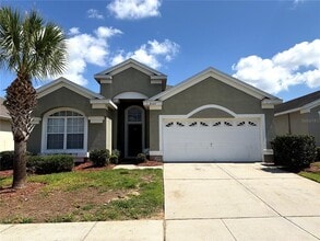 Building Photo - 8127 Fan Palm Way