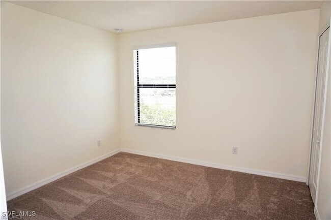 Building Photo - 4232 Raffia Palm Cir