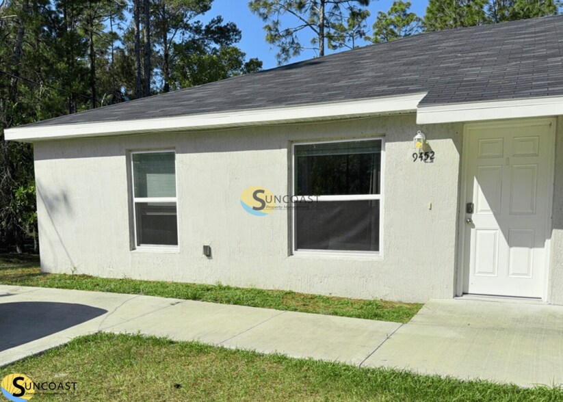 Building Photo - 9452 N Travis Dr