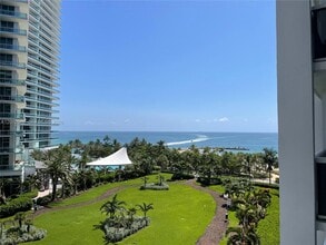 Building Photo - 10275 Collins Ave