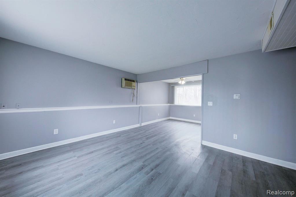 Lower unit living and dining rooms - 217 Glenmoor St