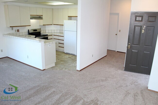 Building Photo - $2,895 - Upstairs 2 Bedroom/1 Bath Condo