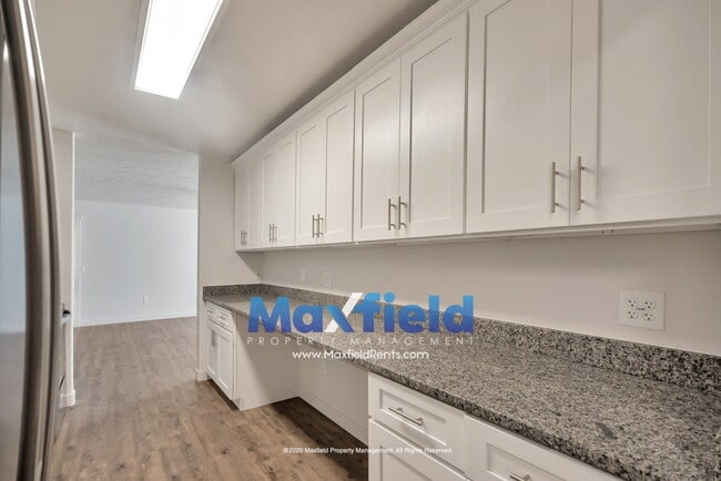 Building Photo - Pet Friendly Main Floor 3BD 2BA 2GA Unit Near Costco and High School
