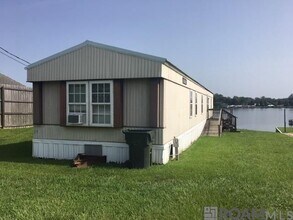 Building Photo - 7486 False River Rd