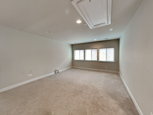 Building Photo - Breathtaking 4-bedroom home in the highly ...