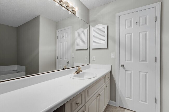 Building Photo - Freshley Painted! Updated Flooring! Centra...