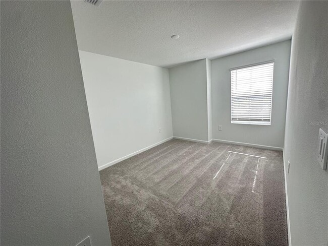 Building Photo - 5675 Portico Pl