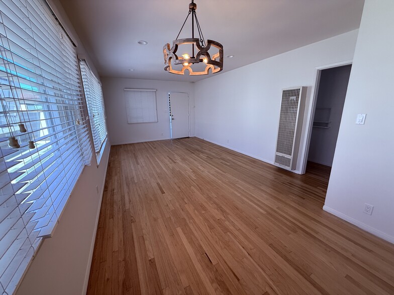 Open Dining and Living area with hardwood floor - 811 S Catalina Ave