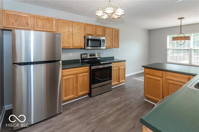 Building Photo - 9361 Eden Woods Ct