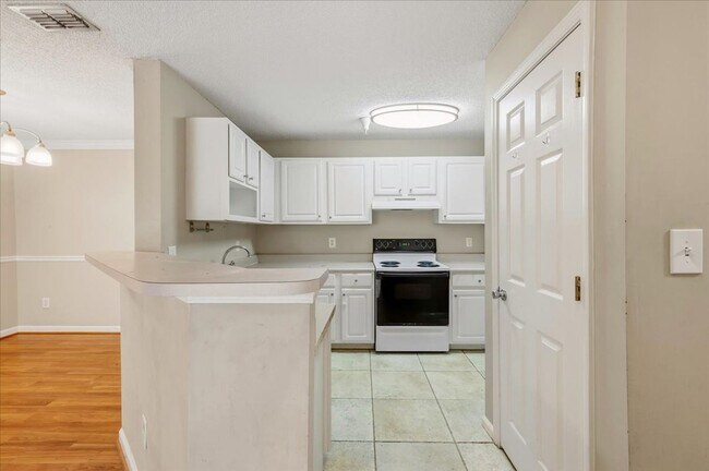 Building Photo - Spacious 3BR Condo in Gated White Marsh Island Community | Resort-Style Amenities | Pet-Friendly
