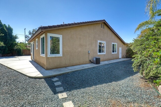 Building Photo - Charming 1-Story Corner Lot Home with Great Room & Patio