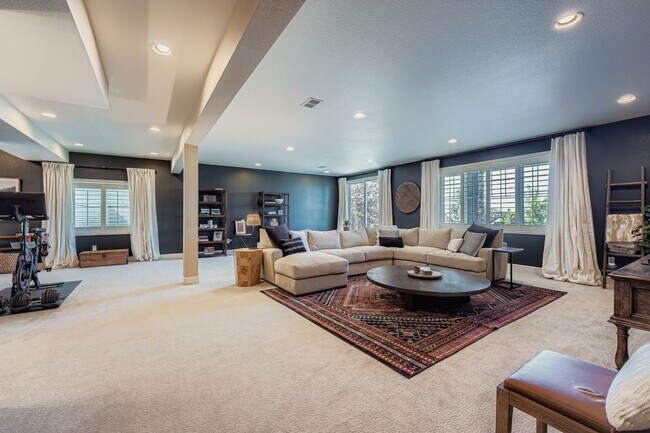 Building Photo - Beautifully maintained 5-bedroom home with a large finished basement, club access, and top-rated ...