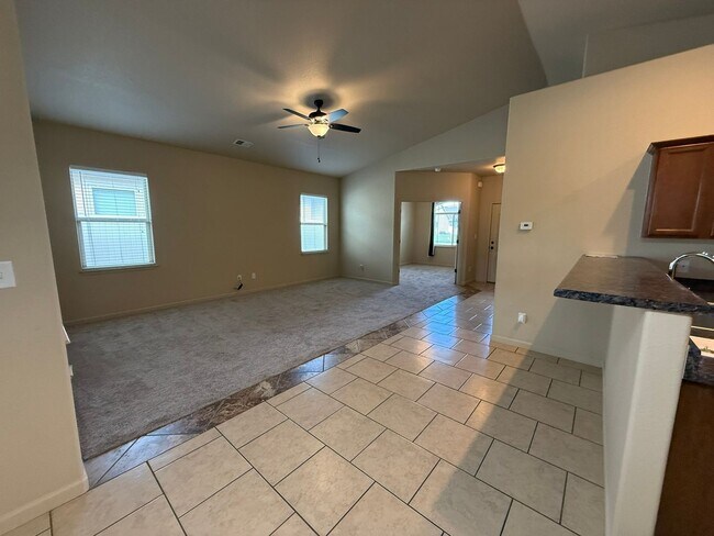 Building Photo - Beautiful 4 bedroom, 2 bath, 3 car garage ...