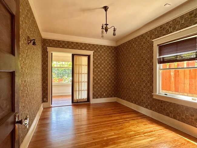Building Photo - Meticulously Restored 1920s Craftsman on a Private, Hedged Lot | Pet Friendly!