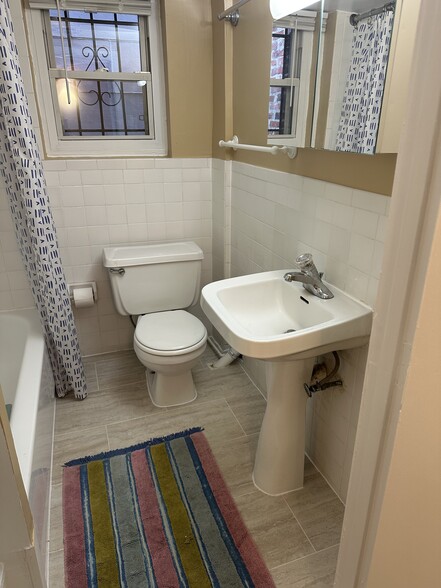 Bath with rug - 1336 Kenyon St NW