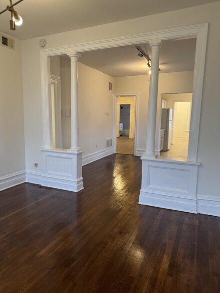 Decorative moldings, modern LED lighting and polished wood floors - 118 Philip St