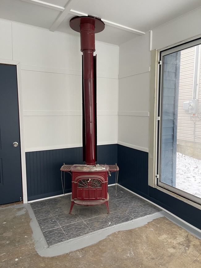 wood stove in Sunroom - 913 Madison Ave