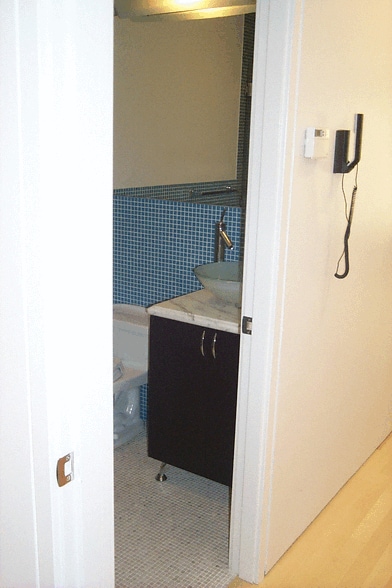 Donstairs bathroom have Italian tiling, marble fllor - 12A Reno Pl