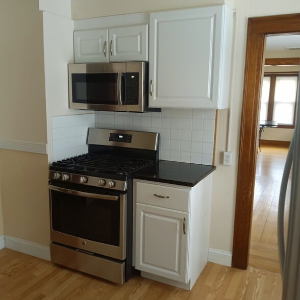 Kitchen - New Stainless Steel Stove & Microwave - 261 View St