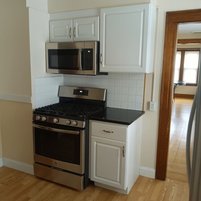 Kitchen - New Stainless Steel Stove & Microwave - 261 View St