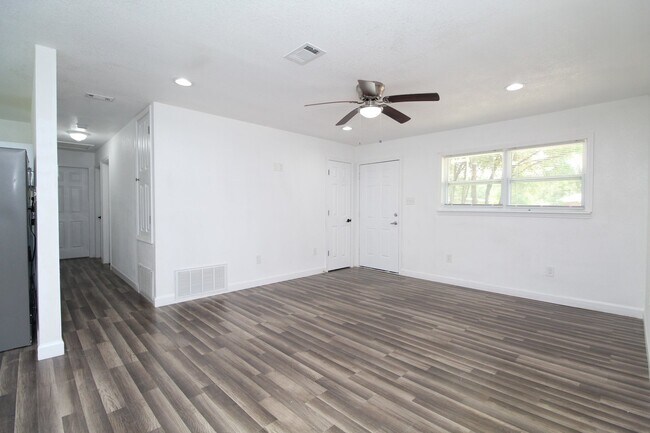 Building Photo - 4BR Home with LVP Flooring, Open Layout & Large Backyard Near Dogwood
