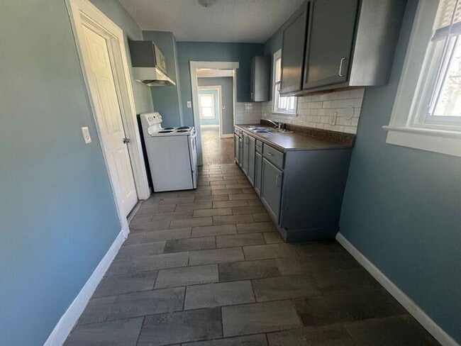 Building Photo - Charming 3BR 2BA Home w/ Fenced Yard + Covered Porch in KC