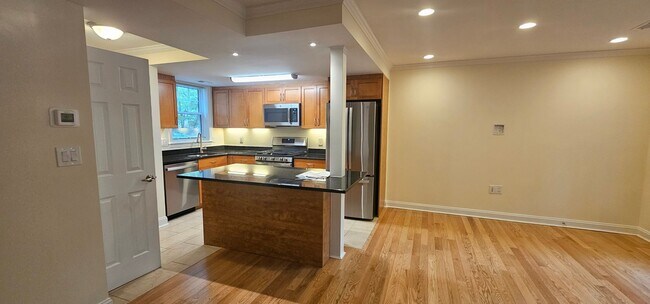 Building Photo - Spacious 2-bedroom townhouse on beautifully landscaped grounds.