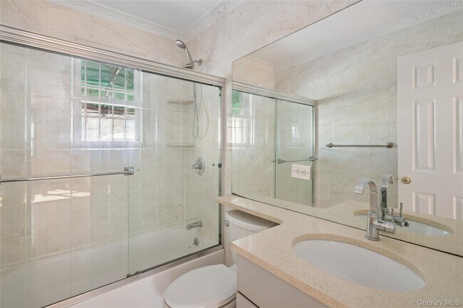 Building Photo - 214-27 38th Ave