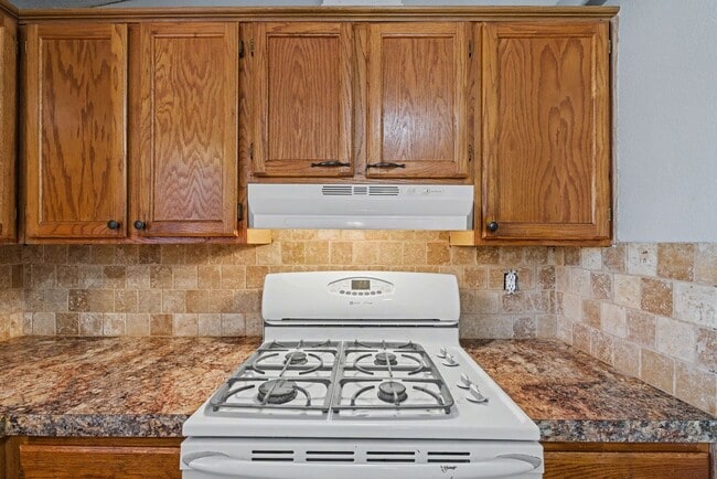 Building Photo - 3-Bed Home with Fireplace, Fenced Yard & Flexible Living Space