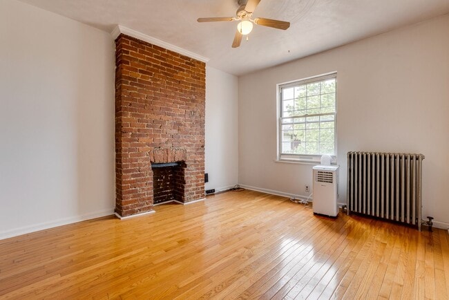 Building Photo - AVAILABLE June 2026 - Beautiful 4 Bedroom, 2 Bath Home w/ Front Porch Swing!