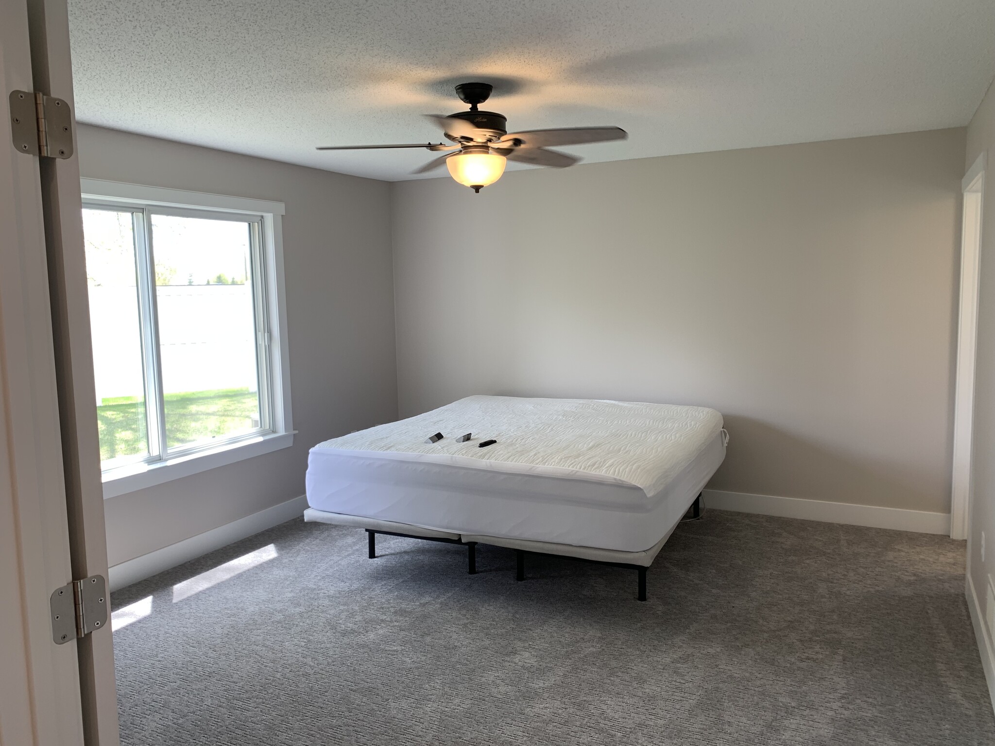 Master bedroom accommodates king sized bed (not included) - 9057 Prairieview Ln N