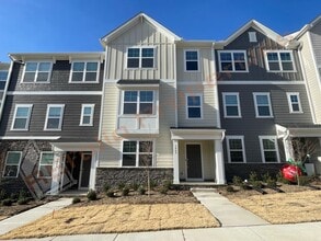 Building Photo - Brand New 3 Story, 4 bedroom, 3.5 bathroom Townhome Featuring a 1st floor Guest Suite, 2 Car Gara...
