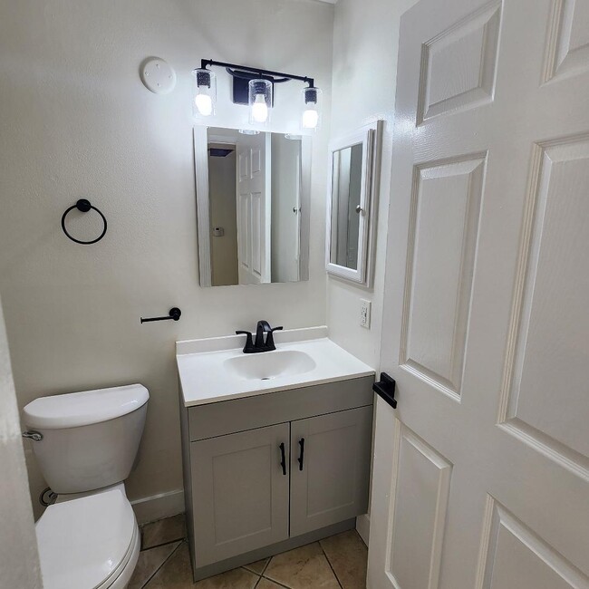 New Vanity, new lights, new water fixtures, new toilet - 10901 Laurel Canyon Blvd