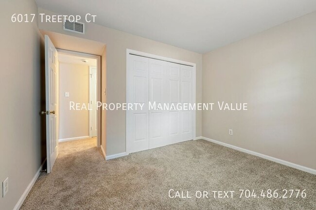 Building Photo - 6017 Treetop Ct