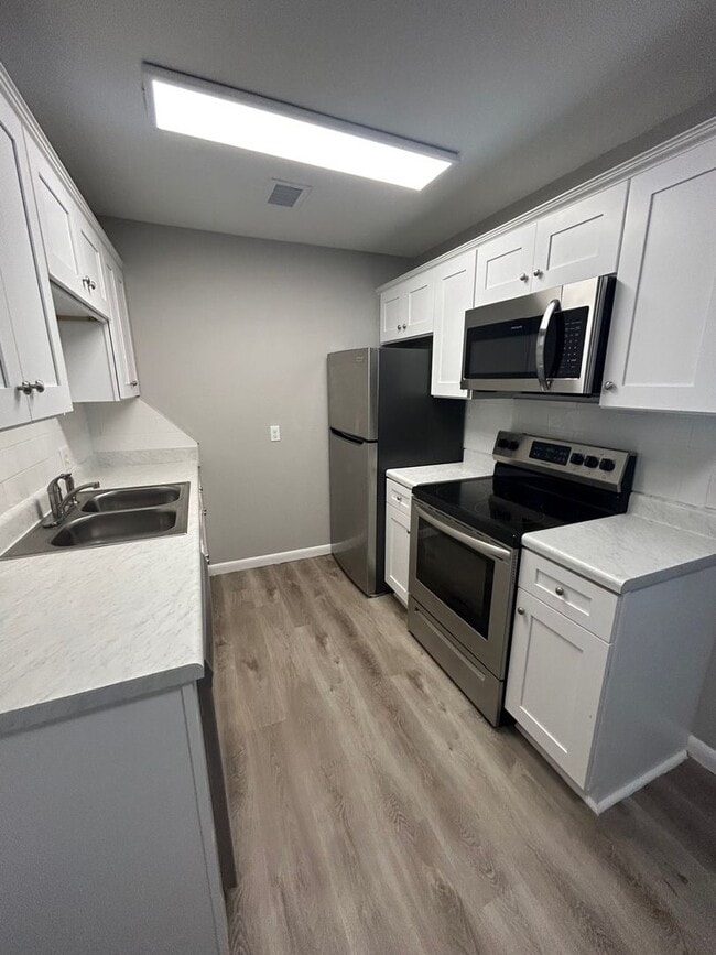 Building Photo - Built for Living. Designed for You.