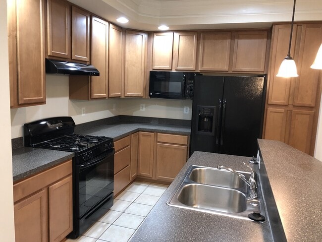 Building Photo - 2 Level Townhouse/condo with one car garage in the Watkins Mill Town Center
