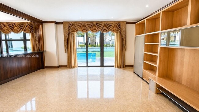 Building Photo - 9801 Collins Ave