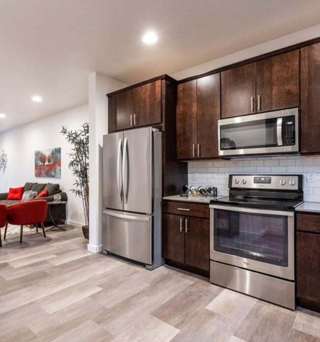 Building Photo - Spacious 3-Story at a Modern Community Featuring 3 Bedrooms 3.5 Bathrooms