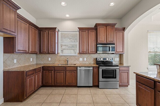 Building Photo - 11230 Begonia rock