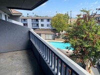 Building Photo - Move-In Special! Large 2BR Condo with GARAGE
