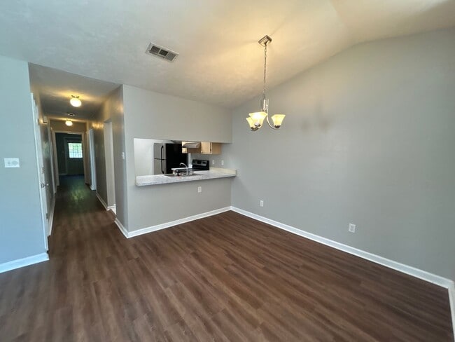 Building Photo - 2BR/2BA Townhome. BRAND NEW FLOORS