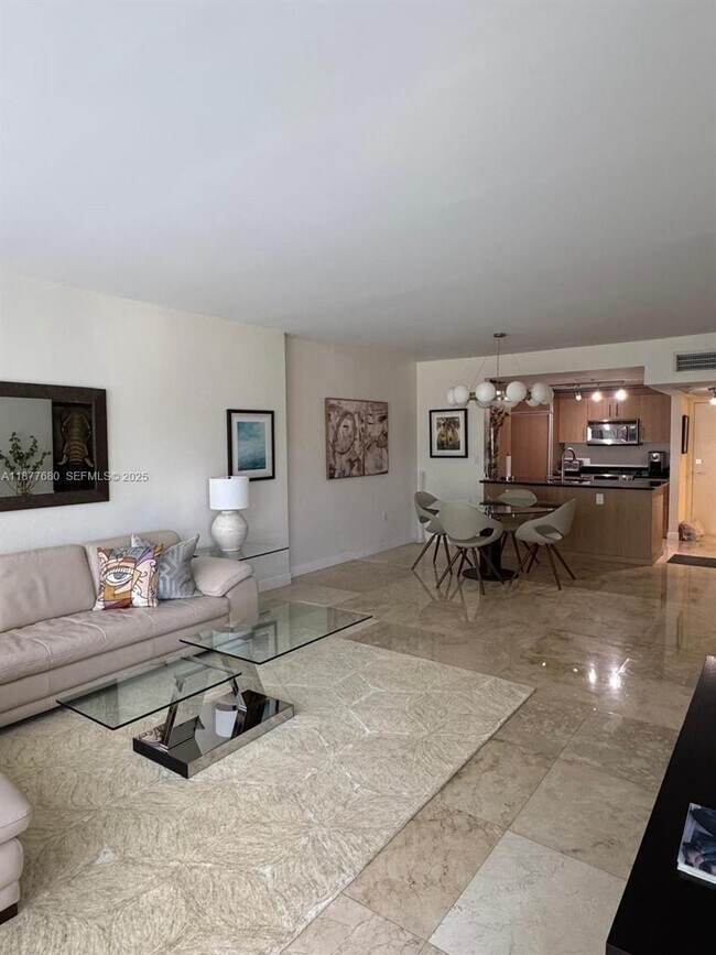 Building Photo - 10275 Collins Ave