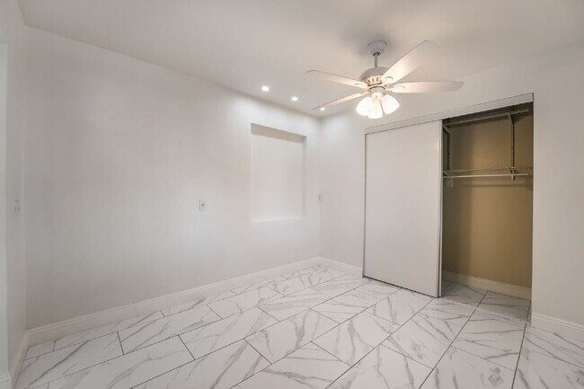 Building Photo - Single Story,  Totally Renovated , 3 bedroom, 2 bathroom Home with  extensive privacy and gated h...