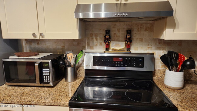 Building Photo - 5801 N Banana River Blvd