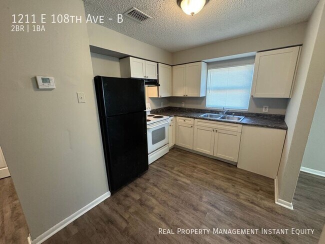 Building Photo - 1211 E 108th Ave