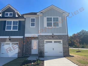 Building Photo - Move In by April 30 & Save $200/Month! Townhome Only $1,745! Regular $1,995 — Available NOW